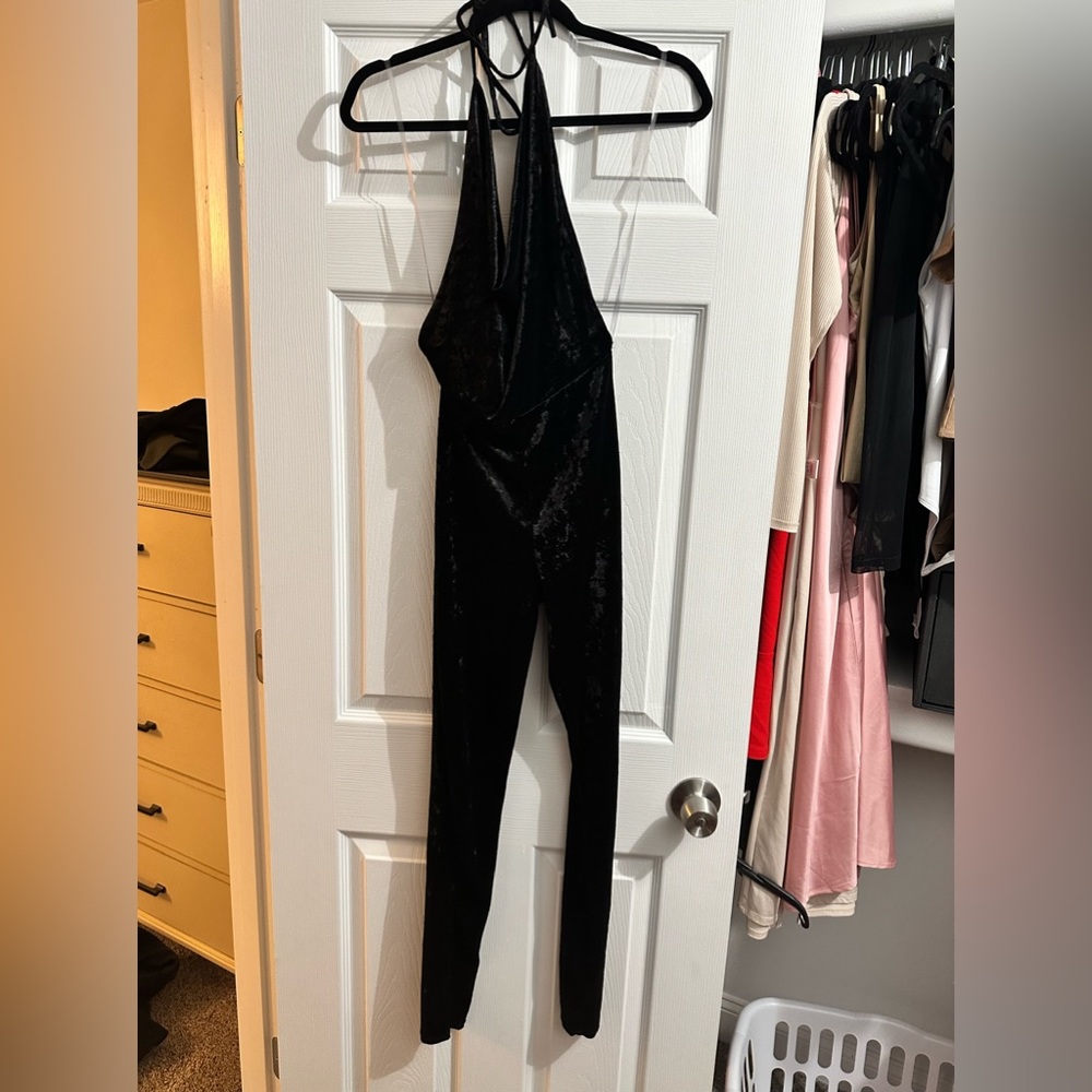 A beautiful velvet, black and backless jumpsuit